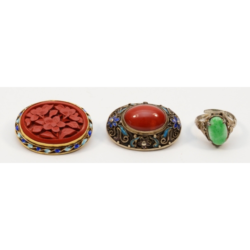 197 - A Chinese export silver gilt and enamel cinnabar floral brooch, 33mm, together with a silver jadeite... 