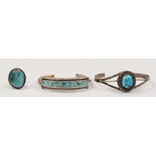 198 - Two silver native American turquoise bracelets, unmarked, and a silver turquoise free form ring, 40g... 