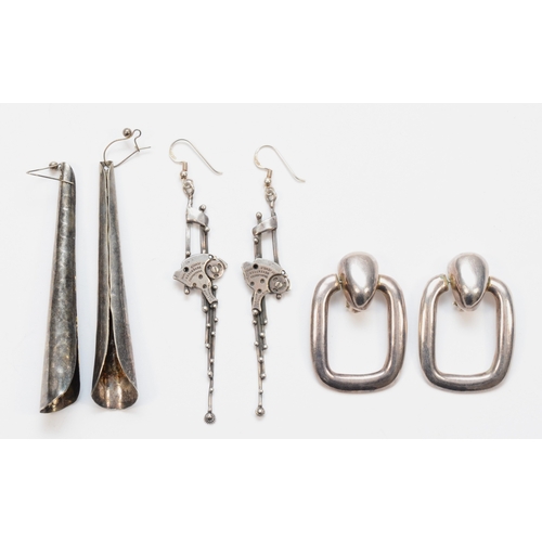 202 - Three pairs of silver Modernist drop earrings to include a pocket watch movement parts example, sign... 