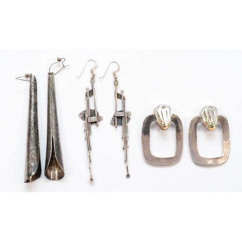 202 - Three pairs of silver Modernist drop earrings to include a pocket watch movement parts example, sign... 