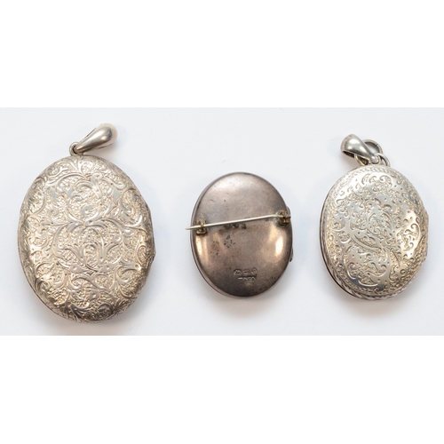 203 - A Victorian silver brooch locket inscribed Jean, Birmingham 1878, 40mm, together with two Victorian ... 