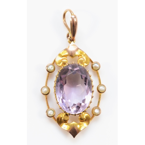 237 - An Edwardian gold amethyst and seed pearl openwork pendant, unmarked, 35mm, 2.8gm.