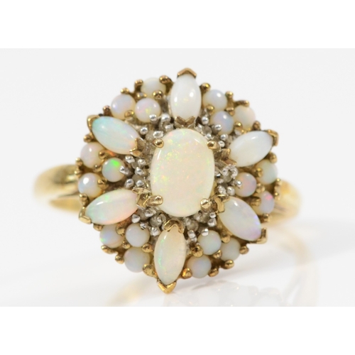 239 - A 9ct gold opal floral cluster ring, flashes of red and green, T, 3.7gm.