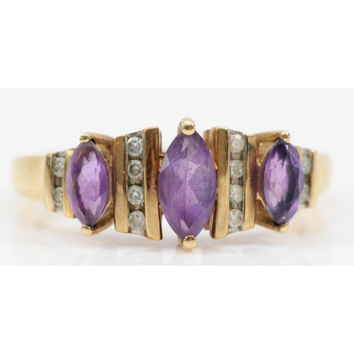 242 - A 9ct gold three stone amethyst and eight cut diamond dress ring, R, 2.8gm.