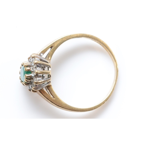 258 - A 9ct gold emerald and eight cut diamond cluster ring, I, 2.1gm.