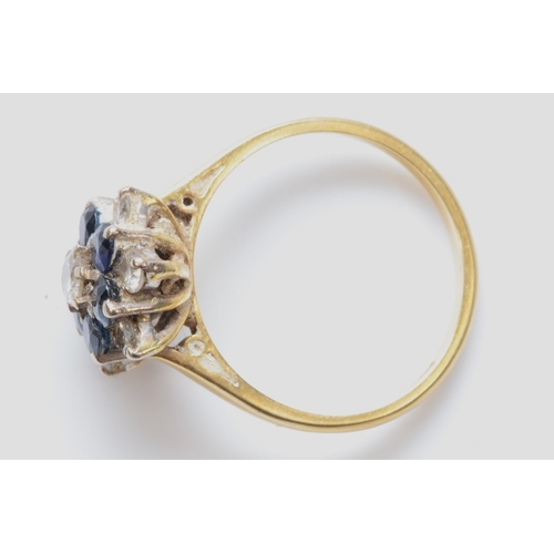 260 - An 18ct gold sapphire and brilliant cut diamond cluster ring, estimated center diamond weight .15, N... 