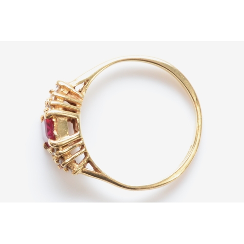 266 - An 18ct gold synthetic ruby and white stone dress ring, K-L, 2.4gm.