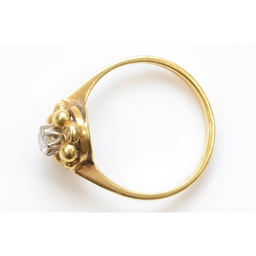 277 - An 18ct gold single stone brilliant cut diamond floral ring, estimated weight .20, N, 2.9gm.