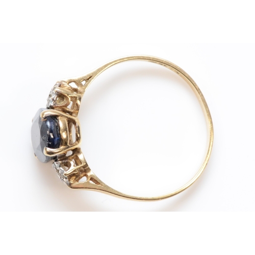 283 - A 9ct gold sapphire and illusion set diamond dress ring, P, 1.7gm.