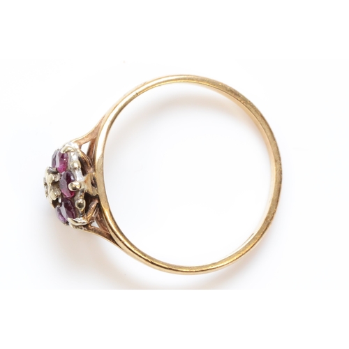 290 - A 9ct gold ruby and eight cut diamond dress ring, P, 2.1gm.