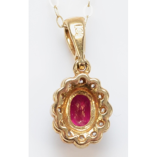 302 - A 9ct gold synthetic ruby and eight cut diamond cluster pendant, on 375 gold chain, 18mm, 2gm.