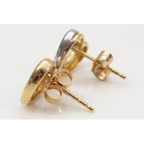 304 - A pair of 9ct gold two tone heart shaped stud earrings, with brilliant cut diamonds, 8mm, 1.3gm.