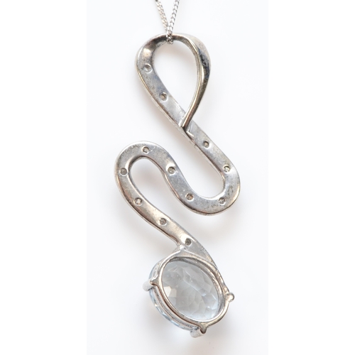 305 - A 9ct white gold beryl and eight cut diamond pendant, on a 375 white gold chain, 32mm,2.2gm.