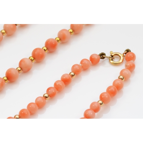 308 - A 9k gold clasp and bead coral necklace, 5mm beads, 42cm, together with a matching bracelet.