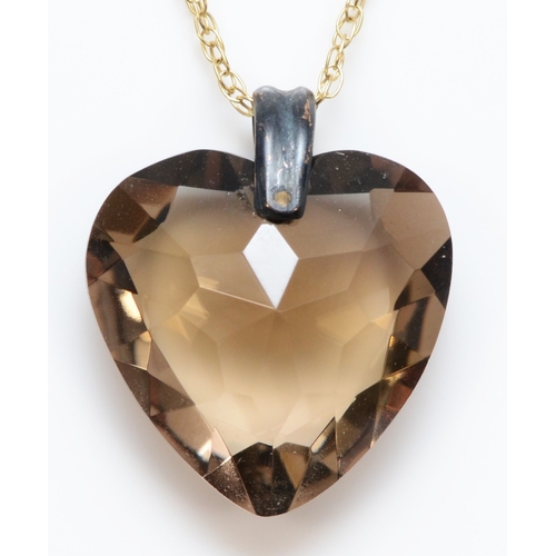 309 - A heart cut smokey quartz on 375 gold chain, 20 x 17mm, 3.7gm.