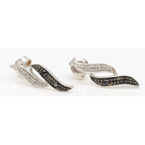 332 - A pair of 375 white gold eight cut diamond and black stone drop earrings, 17mm, 1.3gm.