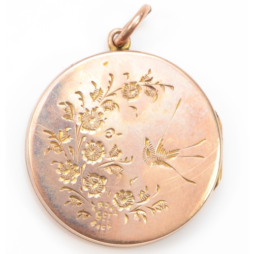 334 - An Edwardian 9ct gold front and back circular locket, with chased floral decoration, 24mm, 4.5gm.