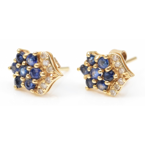 357 - A pair of gold sapphire and brilliant cut diamond flower stud earrings, unmarked, butterfly backs ma... 