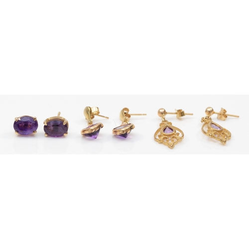 365 - A pair of 9k gold amethyst openwork drop earrings, 26mm, together with two pairs of unmarked gold am... 