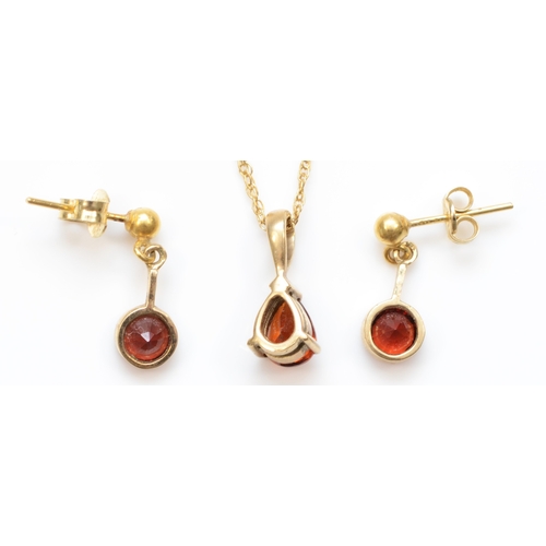 366 - A gold garnet pendant, unmarked, on a 375 gold chain, 13mm, together with a pair of 9ct gold garnet ... 