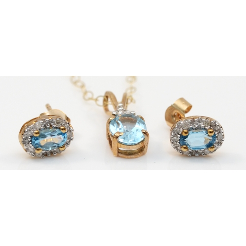 370 - A 9k gold topaz and eight cut diamond pendant, on a 375 gold chain, 15mm, together with a pair of un... 