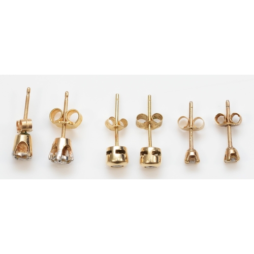 373 - Three pairs of 9ct gold diamond stud earrings, 2.3gm.