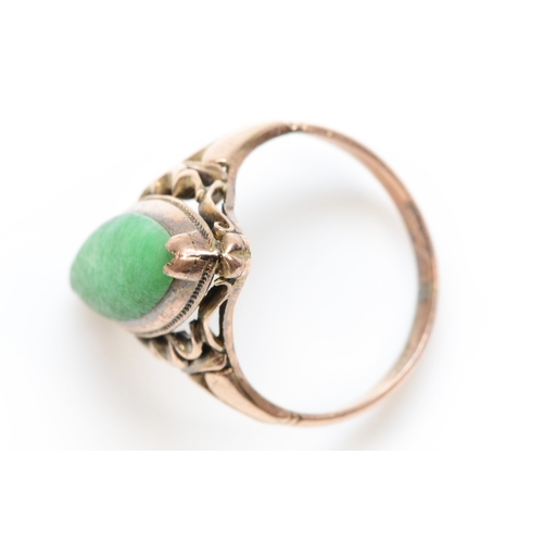 375 - A 14k gold jadeite dress ring, J, 2.7gm.