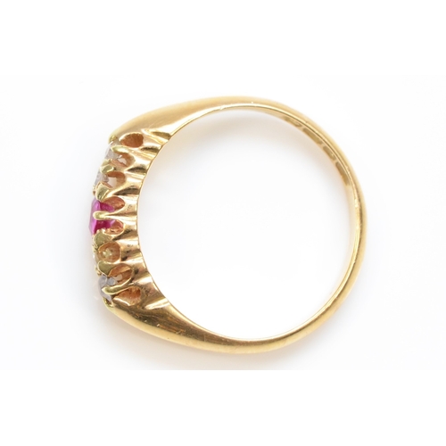 378 - An 18ct gold pink sapphire and eight cut diamond dress ring, L-M, 3.3gm.