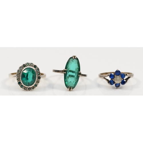 399 - Three 9ct gold and silver dress rings comprising, green marquise paste stone dress ring, N, green an... 