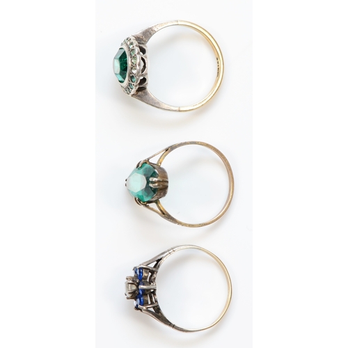 399 - Three 9ct gold and silver dress rings comprising, green marquise paste stone dress ring, N, green an... 