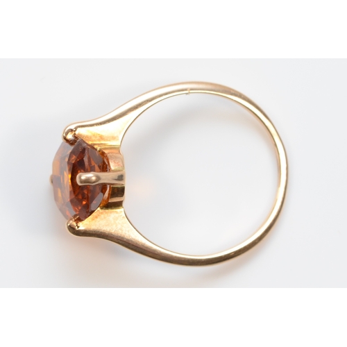 403 - A gold scissor cut citrine cocktail dress ring, unmarked, R-S, 3.5gm.