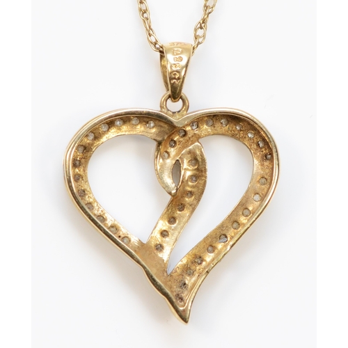 410 - A 375 gold eight cut diamond heart shaped pendant, on 9k gold chain, 21 x 19mm, 2.7gm.