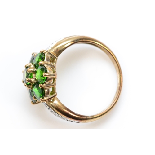 417 - A 9ct gold diopside cluster ring with eight cut diamond shoulders, K-L, 3gm.