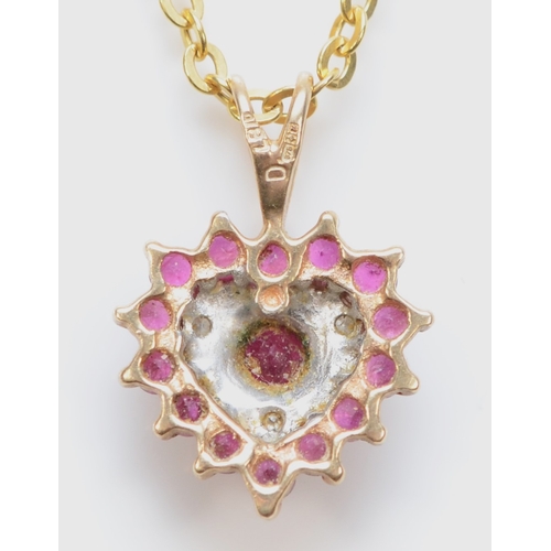 425 - A 9ct gold ruby and eight cut diamond heart shaped pendant, on 9kt gold chain, 16mm, 1.7gm.