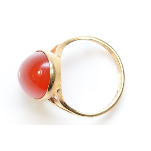 437 - A 9ct gold carnelian dress ring, P-Q, 4.3gm.