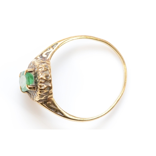 444 - A 9ct gold emerald and eight cut diamond dress ring, L, 1.6gm.