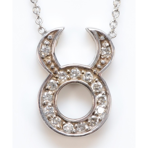 455 - A 14k white gold eight cut diamond Taurus zodiac necklace, 41cm, 2.4gm.