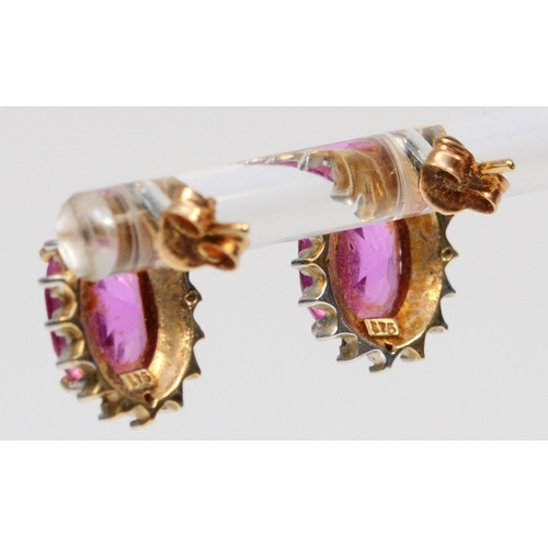 461 - A pair of 375 gold synthetic pink sapphire and diamond stud earrings, 12 x 11mm, 3.2gm.