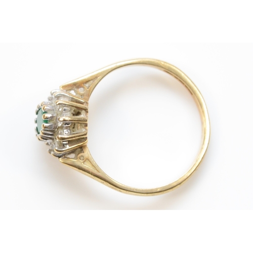 478 - A 9ct gold emerald and eight cut diamond dress ring, L-M, 2.3gm.