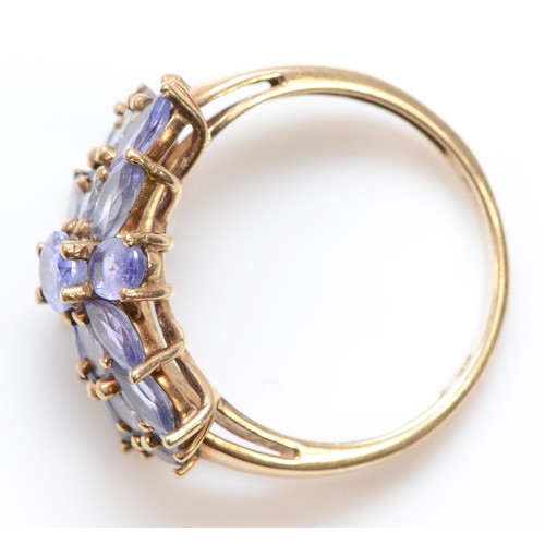 491 - A 9ct gold tanzanite cluster ring, O-P, 3.2gm.