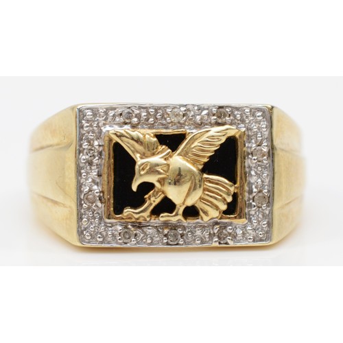 504 - A 9ct gold onyx and eight cut diamond signet ring, with eagle decoration, V-W, 6gm.