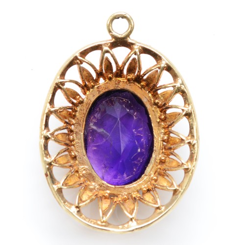 518 - A vintage 9ct gold amethyst pendant, with pierced decoration, 30 x 23mm, 5.5gm.