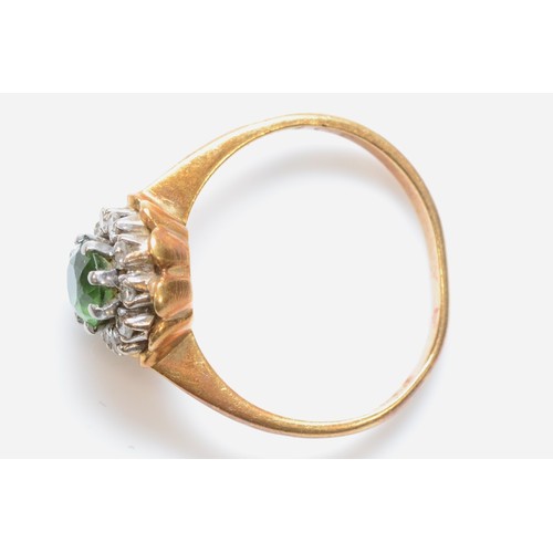 485 - A gold green garnet or tormaline and eight cut diamond dress ring, J-K, 2.9gm.