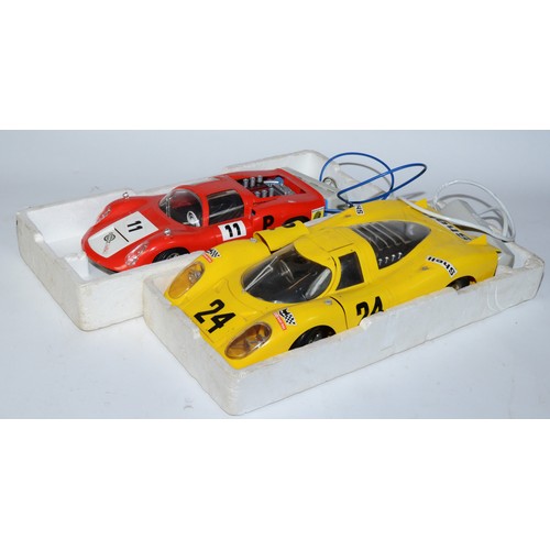 42 - Two 1960s toy model racing cars comprising Porsche Carrera  and Porsche 917, of plastic construction... 