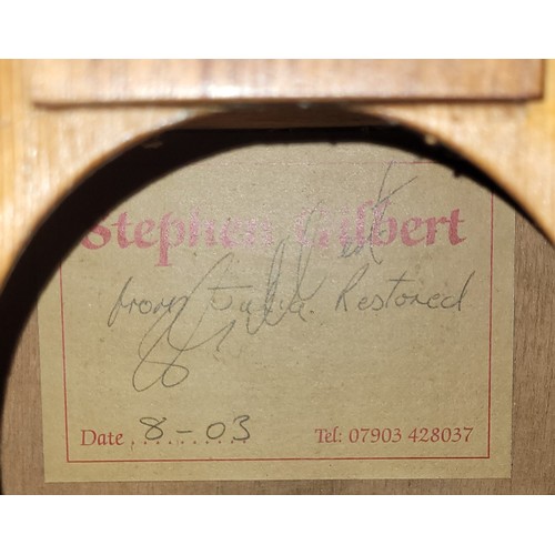 82 - A Stephen Gilbert accuisist guitar, bearing paper label, incomplete - parts missing.