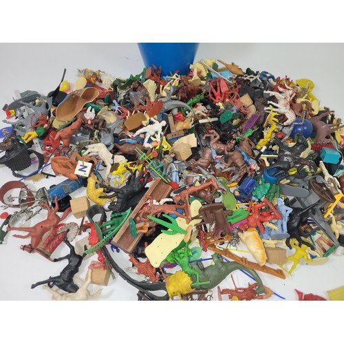 83 - A collection of 1970s Britains toy soldiers, together with a quantity of plastic 'Cowboys & Indians'... 