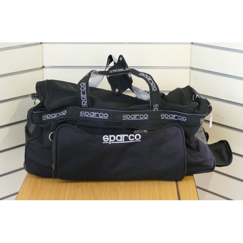 229 - Travel bags to include, two Sparco, large, black, used but good condition. One Ellesse black bag. On... 