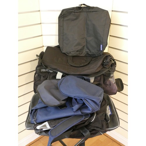 229 - Travel bags to include, two Sparco, large, black, used but good condition. One Ellesse black bag. On... 