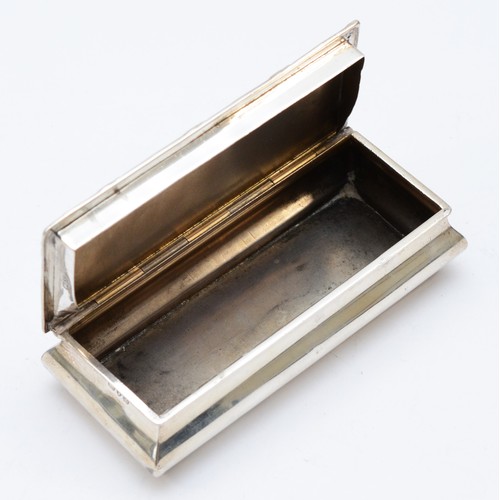 65 - A rectangular silver trinket box, Chester 1922,  with hinged cover, 10.5 x 4.5 x 2.5cm, 83gms