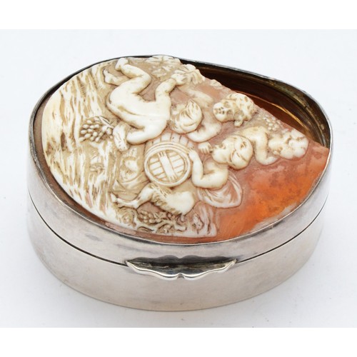 67 - An unmarked silver oval box, with broken shell cameo hinged cover, 5.5 x 4 x 3cm, 47gms